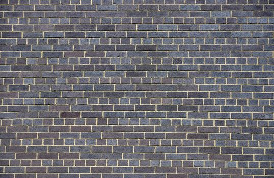 Dark brick wall, perfect as a background