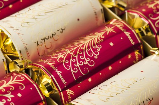 Golden and red Christmas crackers