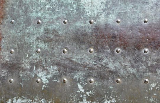 Oxidized bronze surface from an old door