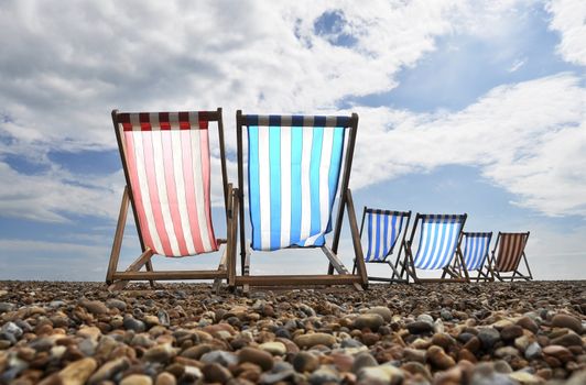 Empty deckchairs on brighton beach