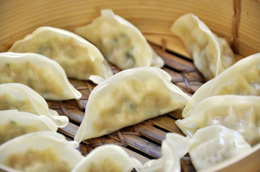 Dumplings in a bamboo steamer