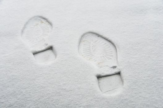 Footprint in the snow, winter concept