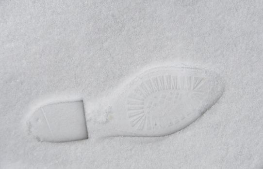 Footprint in the snow, winter concept