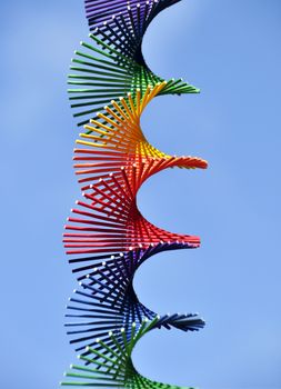 Rainbow colored spiral, sky background