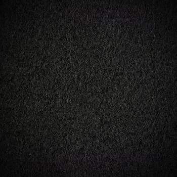 Black wool texture with vignette