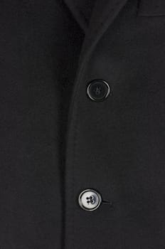 Black woolen coat closeup, male fashion