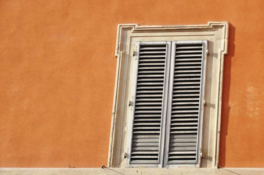 Window in Italy, shutters closed