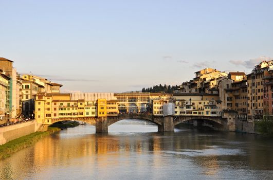 The Ponte Vecchio and the Arno river at sunset