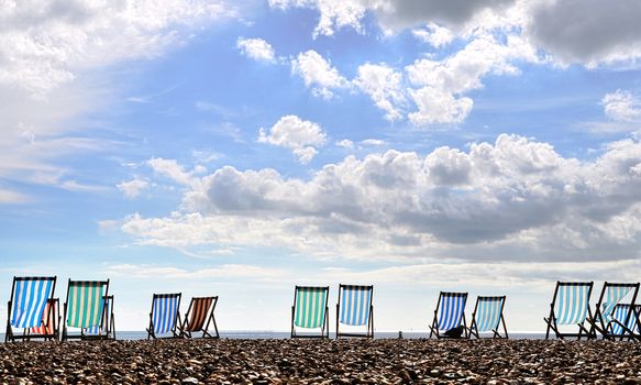 Empty deckchairs on Brighton beach, UK,HDR photography