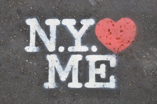 New York loves me stencil on the pavement