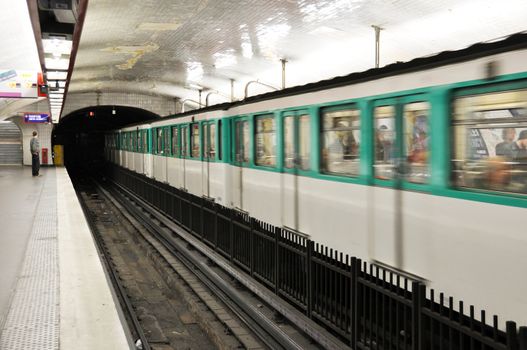 Parisian metro arriving in a station