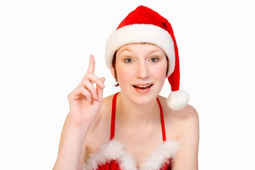 Beautifull girl in christmas bikini and with christmas hat puts her finger up in order to ask a question . With background clipping path for your convenience