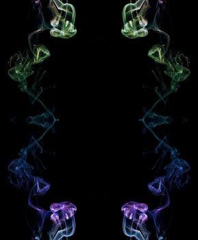 abstract picture of coloured smoke on the black background