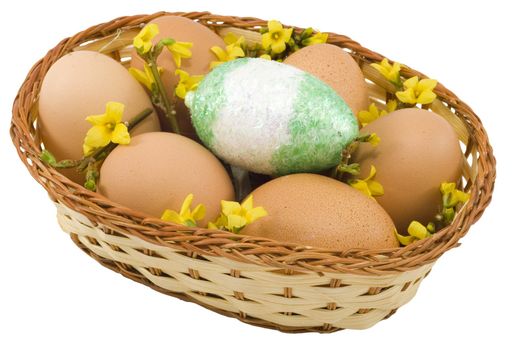 a basket of colourful easter eggs isolated on the white background