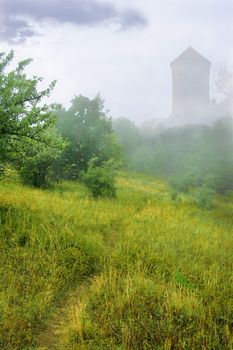 "Collage
1) tower of Vavel (Krakov) 
2) picture of hiland in a bad weather"
          