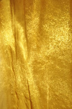 Shiny golden fabric, perfect as a background