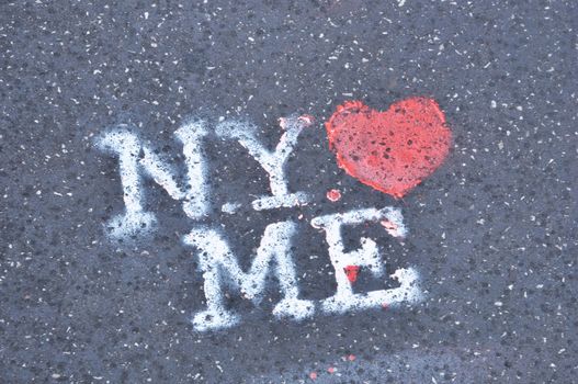 New York loves me stencil on the pavement