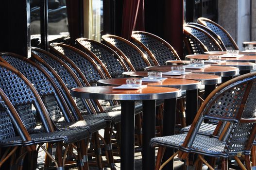 Empty parisian cafe terrace