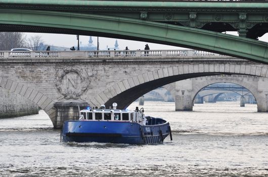 French police boat on the river Seine, Paris, France