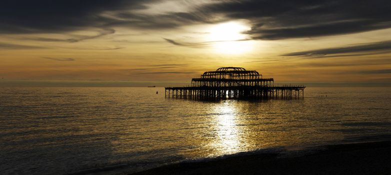 Panoramic view of the West Pier in Brighton at sunset