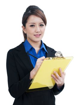 Portrait of a cute young businesswoman writing on clipboard, isolated on white background.