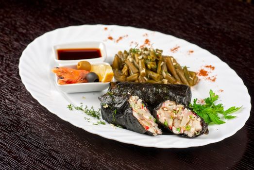 souffle of fillet of pikeperch, shrimps, crab meat, coconut and leek wrapped at nori garnished by string beans
