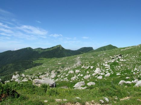 Mountains, rocks; a relief; a landscape; a hill; a panorama; Caucasus; top; a slope; clouds; the sky; a landscape