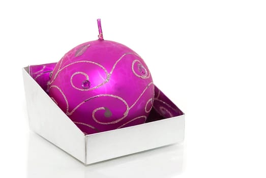 Christmas decorations in a box on white background
