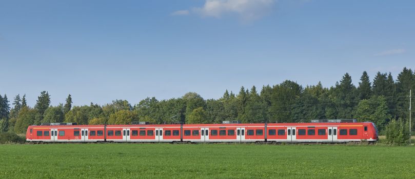 An image of a typical red train in Germany Bavaria