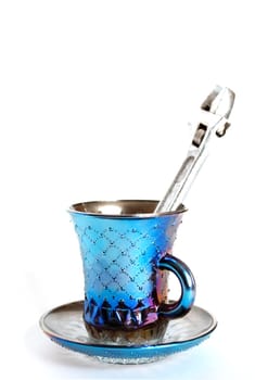 Blue cup with a wrench