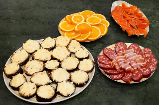 A variety of cuisine on a green table