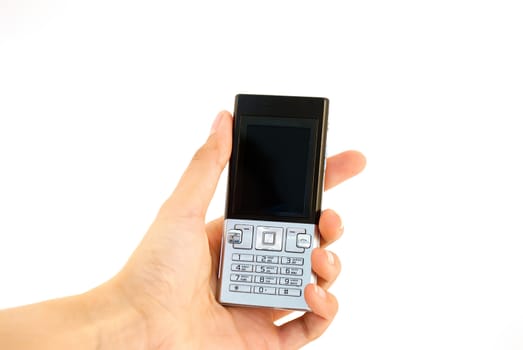 Mobile phone in hand isolated white. Silver phone.