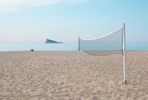 Volleyball net on a lonely sandy beach