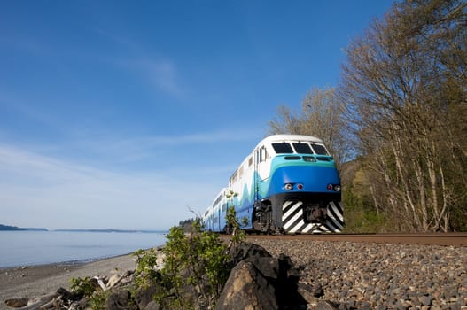 High-speed passenger train on a background of blue sky.