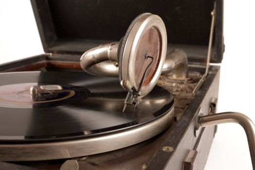 Detail of a vintage grammophone with a 78 rpm vinyl record on