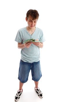 A boy counting or sorting his money cash.  White background.