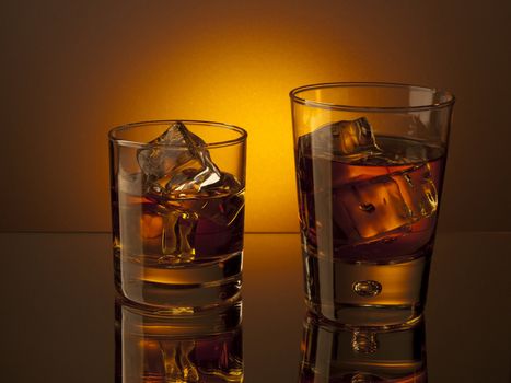 Two glasses of whiskey on the rocks