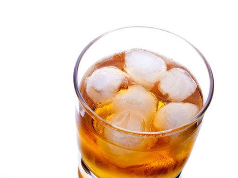 Glass of whiskey on white background