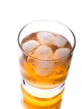 Glass of whiskey on white background