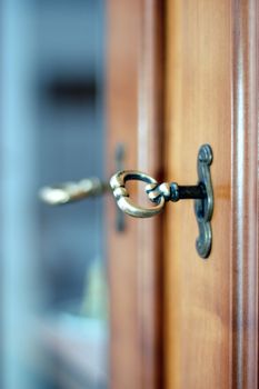 lock and key close-up, vertical view