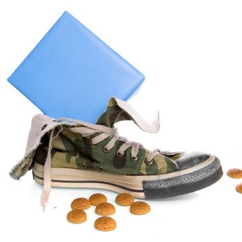 a shoe with cookies and a present, a dutch tradition