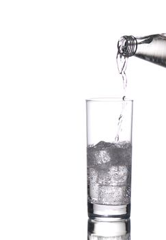 Sparkling water being poured in a glass