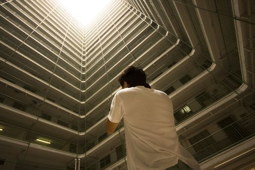 man take photo of Hong Kong public housing apartment block 
