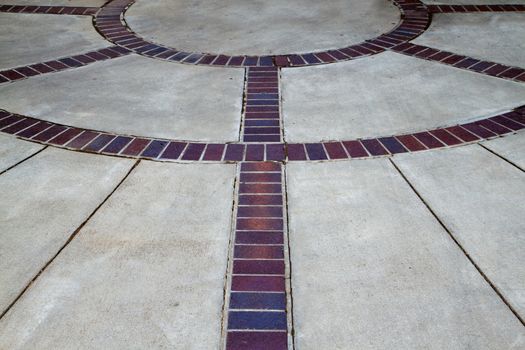 Concrete and red Brick circles on a school plaza