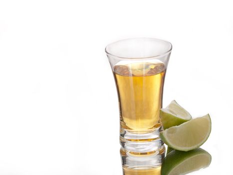 A shot of golden tequila