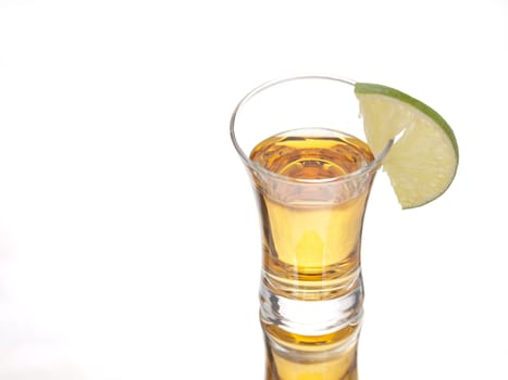 Tequila shot and a slice of lime
