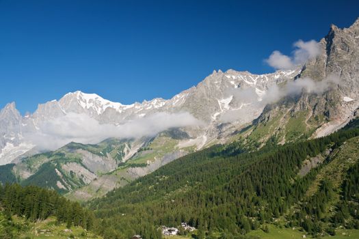 summer view of Ferret Valley and mont Blanc, Courmayeur, Italy. Photo taken with polarized filter