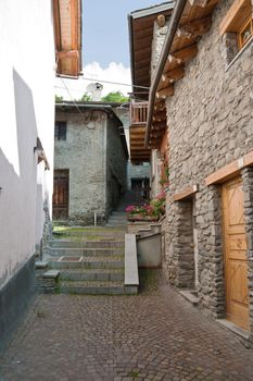 ancient stone homes and steet in La Thuile, Aosta Valley, Italy
