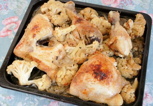 Fresh baked chicken and cauliflower