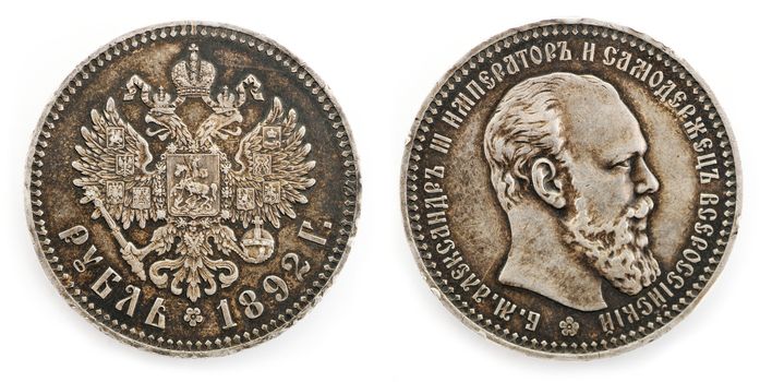Obsolete coin isolated on the white background
